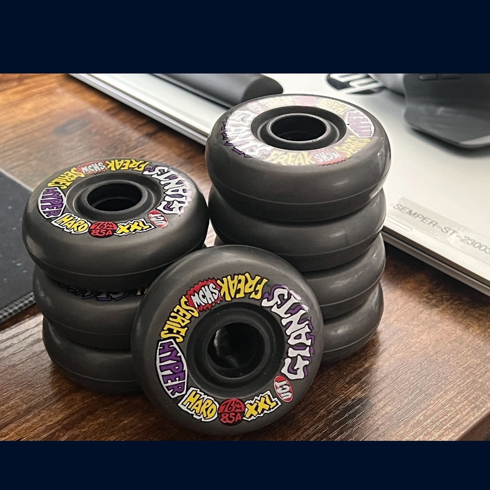 Gray Skateboard Wheels with Colorful Graphics
